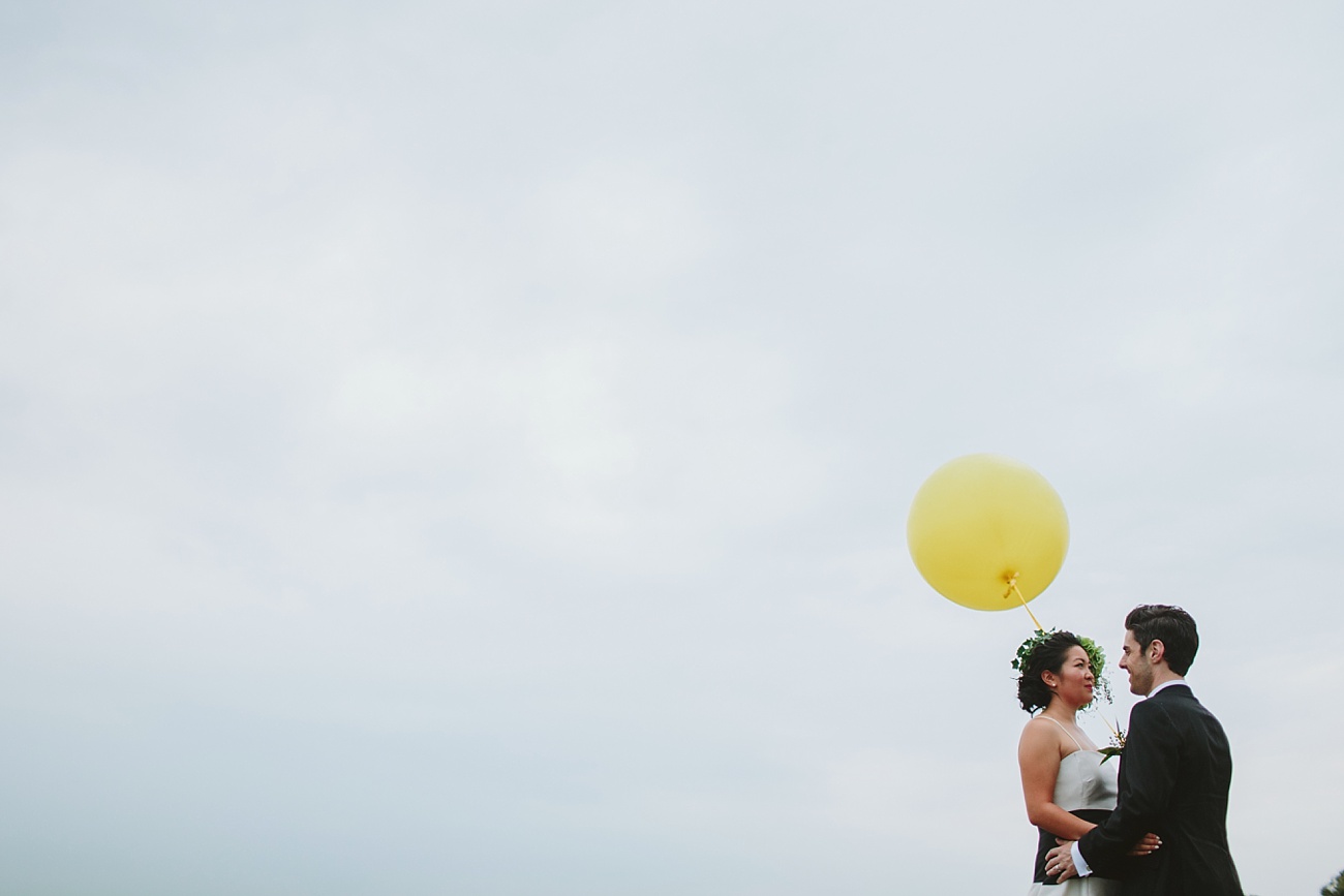 Bride & Groom with a big yellow ballon at Sydney Park